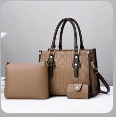 High-quality, stylish women's grey bag with accessories