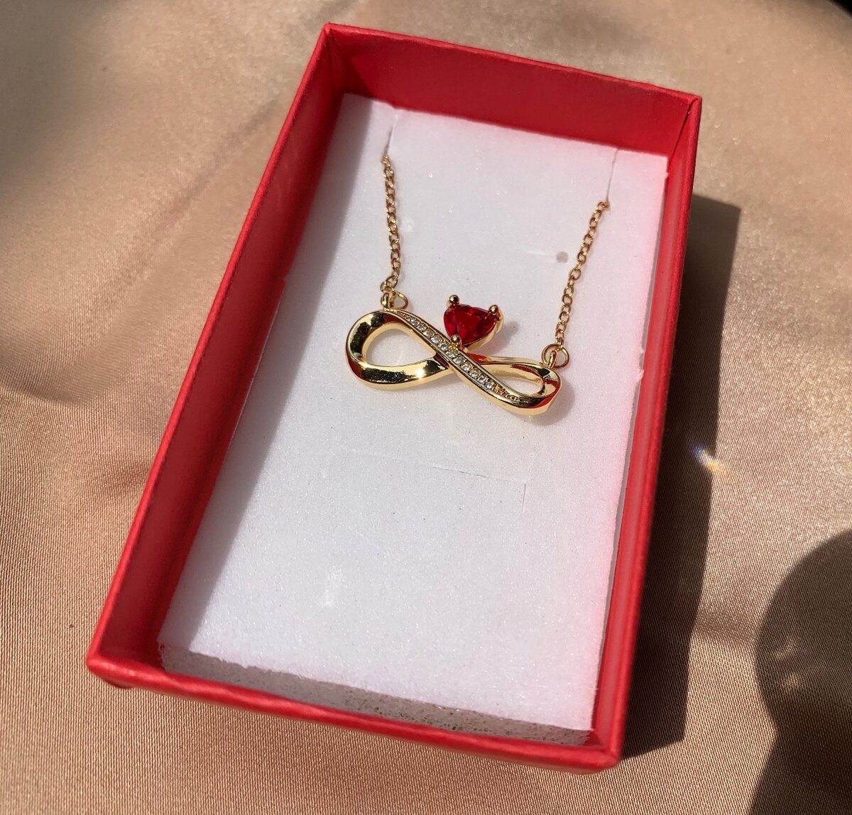 Red infinity pendant necklace
