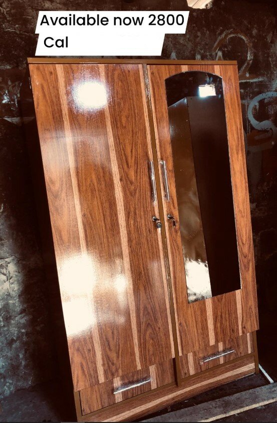 Beautiful brown wardrobe with mirror