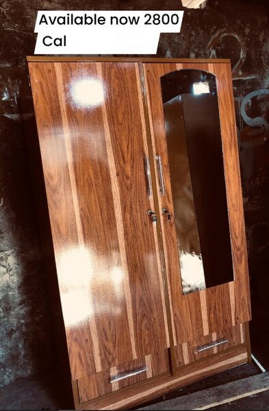 Beautiful brown wardrobe with mirror