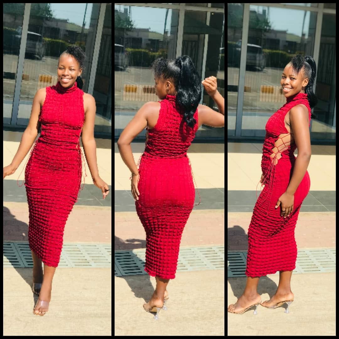 Fitted maxi dress with lacing on the sides