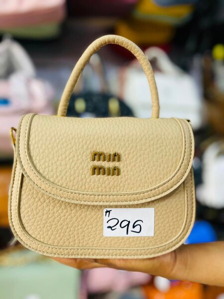 Ladies fancy hand bags beige