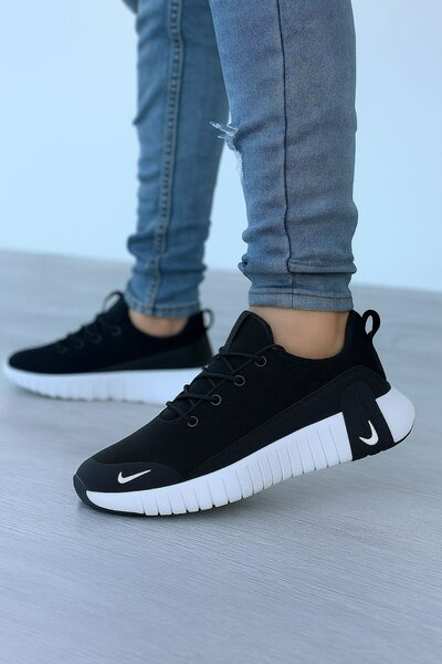 Baskets noires unisexes Nike