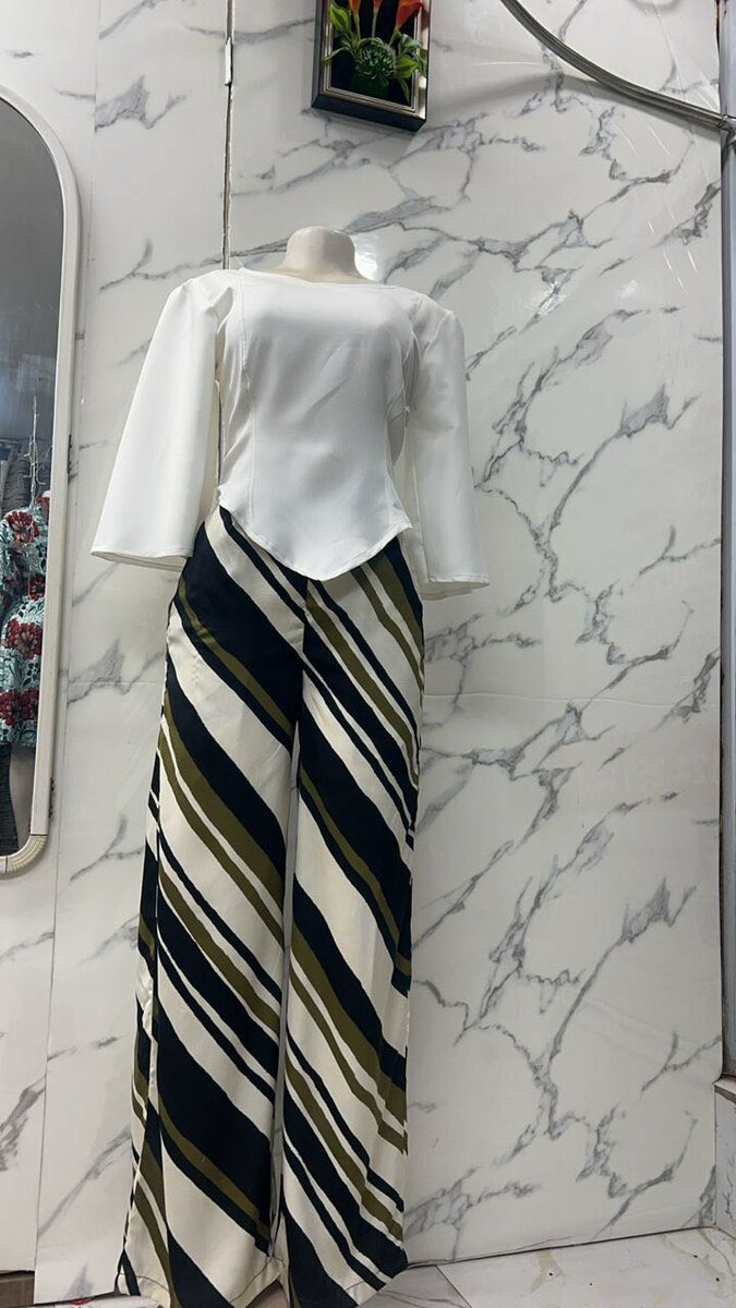 Ready to wear ladies dresses and trousers/top