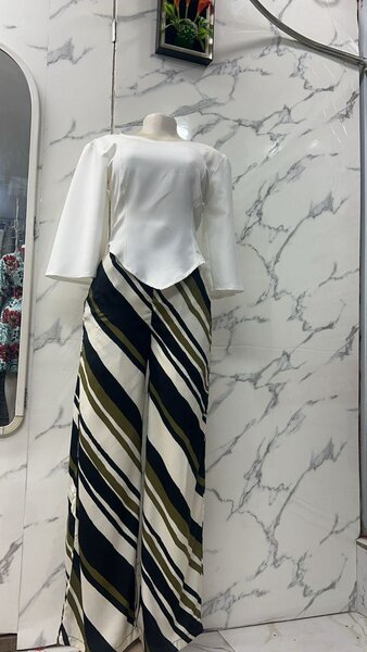 Ready to wear ladies dresses and trousers/top