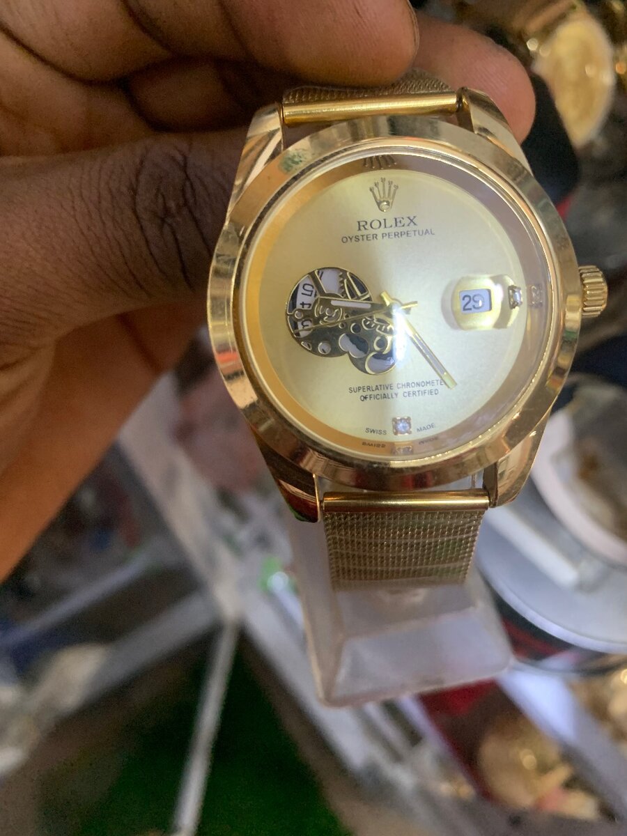 Rolex gold wrist watch