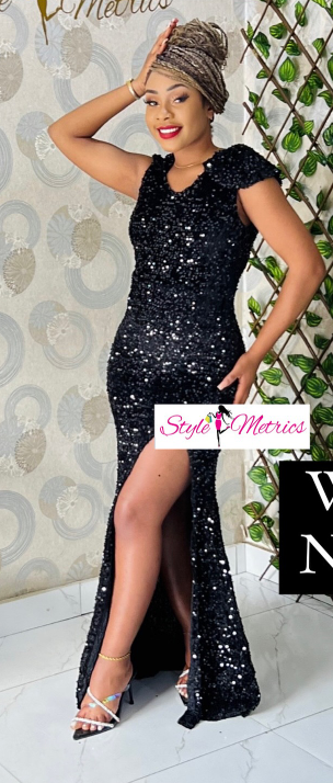 Black long fitted evening dress with a neckline