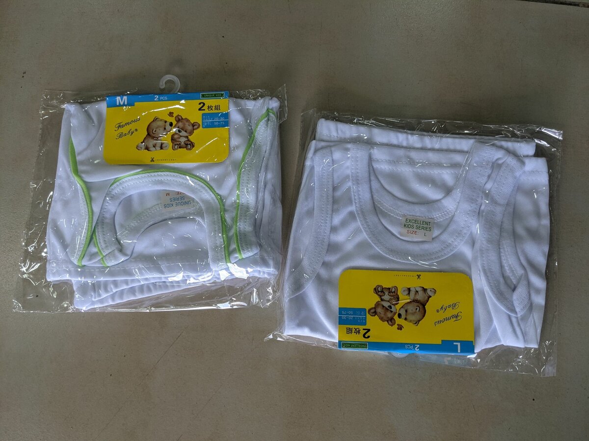 Wear or baby vest top and dawn..