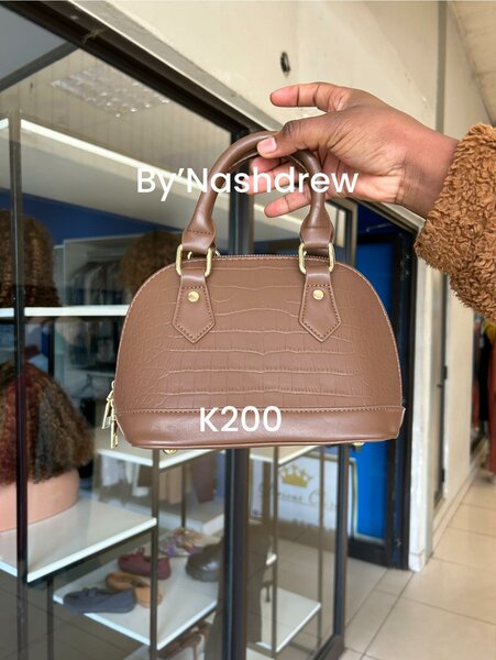 Women's small chocolate-colored handbag