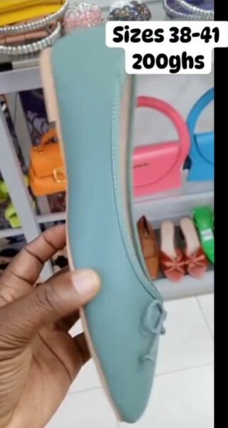 Green ballet flats with a neat bow