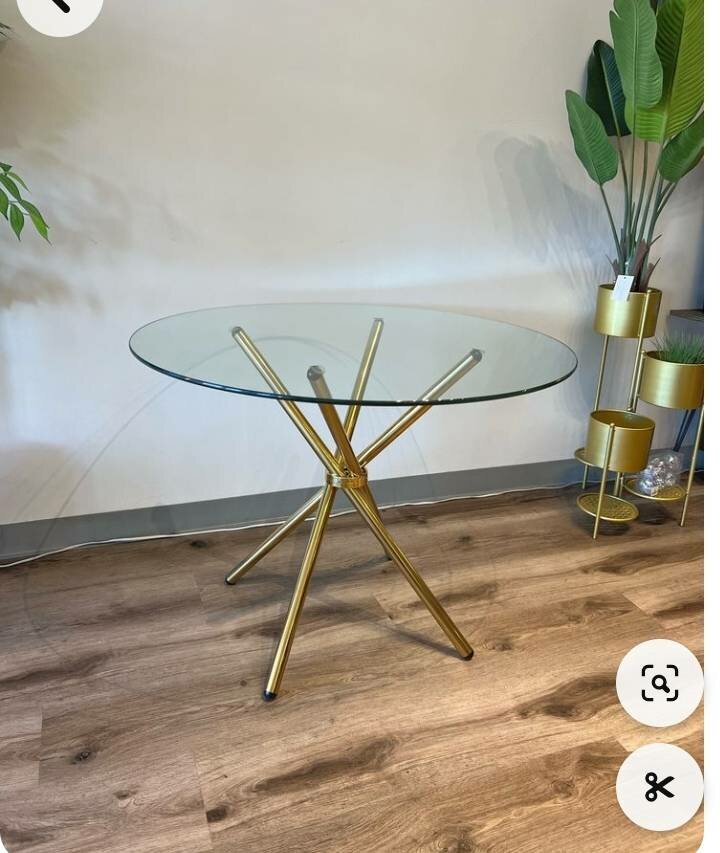 Glass and gold steel table