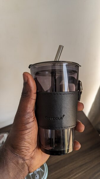 Glass Tumblers with leather handle.