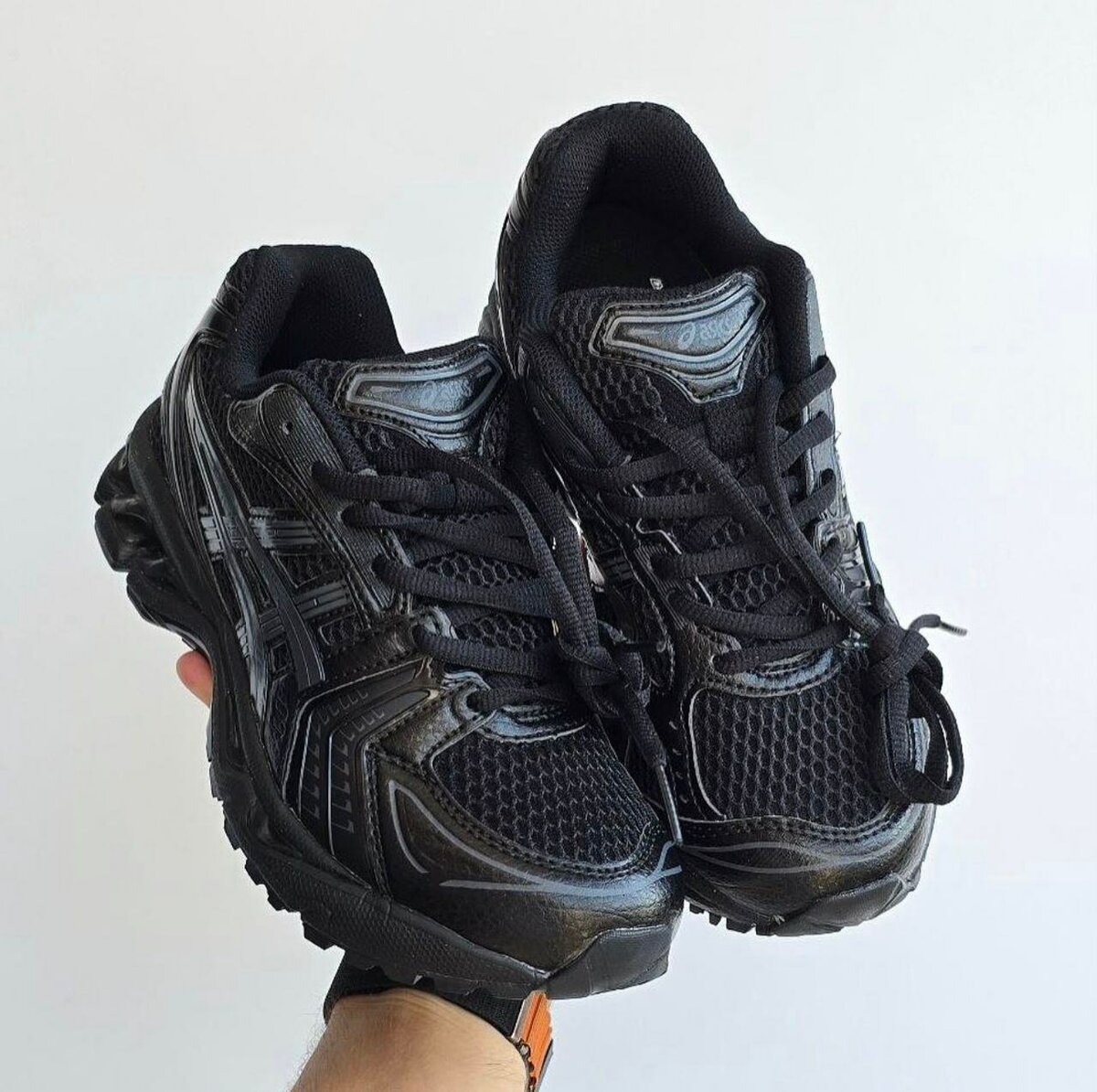 Chaussures de course noires homme