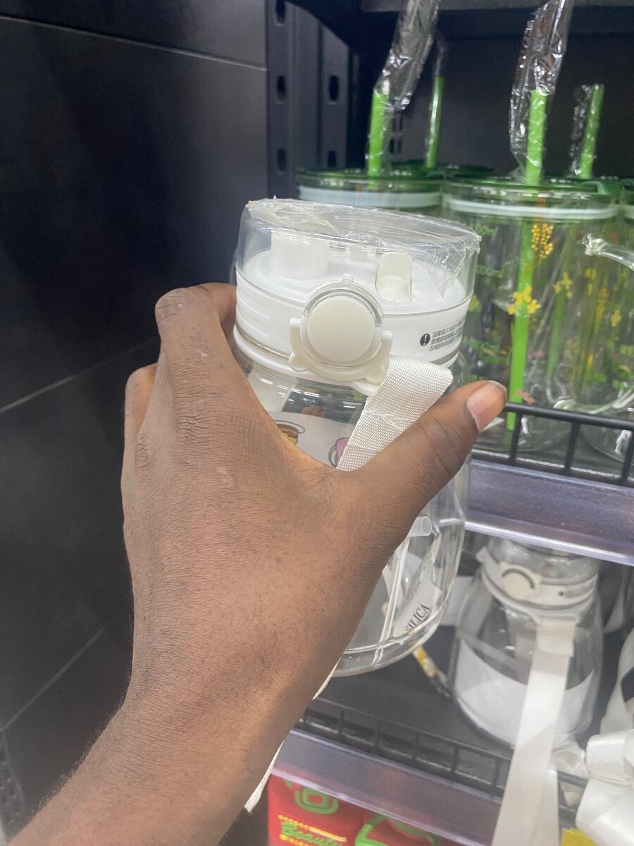 Bouteille en verre avec sangle