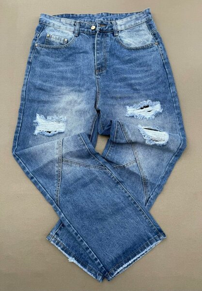 Jeans déchirés tendance