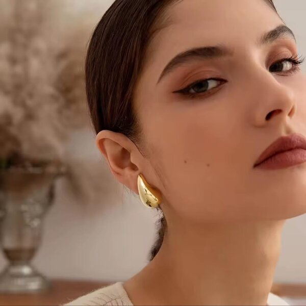 Boucles d'oreilles dorées design