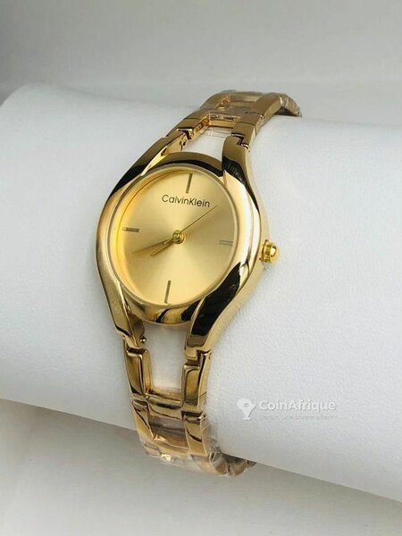 Montre Femme Dorée CK Élégante