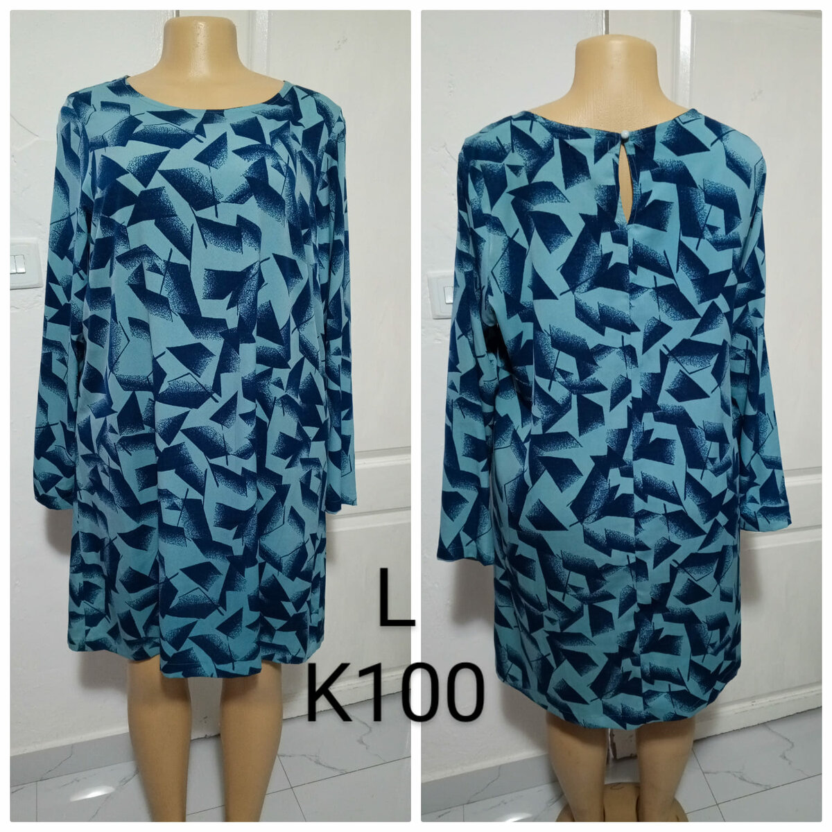 Women's dress is blue with a print, size L