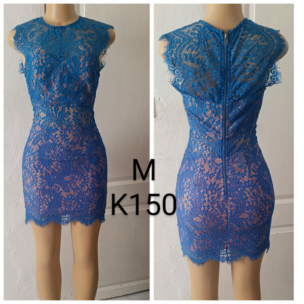 Women's short openwork blue dress, size M