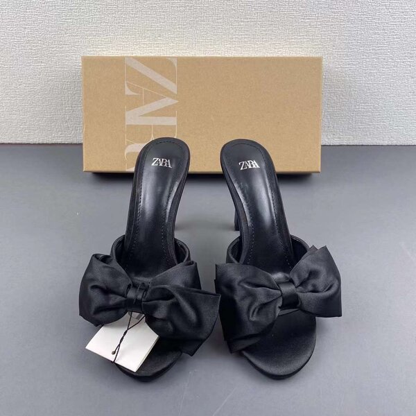 Bow tie slipper heel