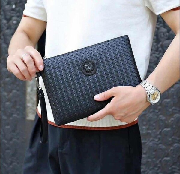 Sac de voyage tressé en cuir