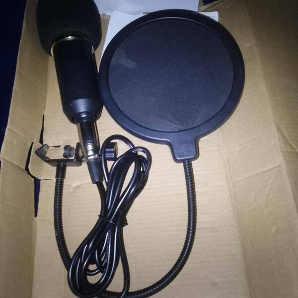 Microphone avec filtre anti-pop