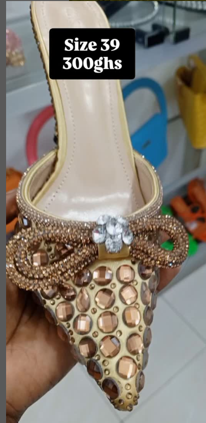 Sandals with rhinestones and a bow