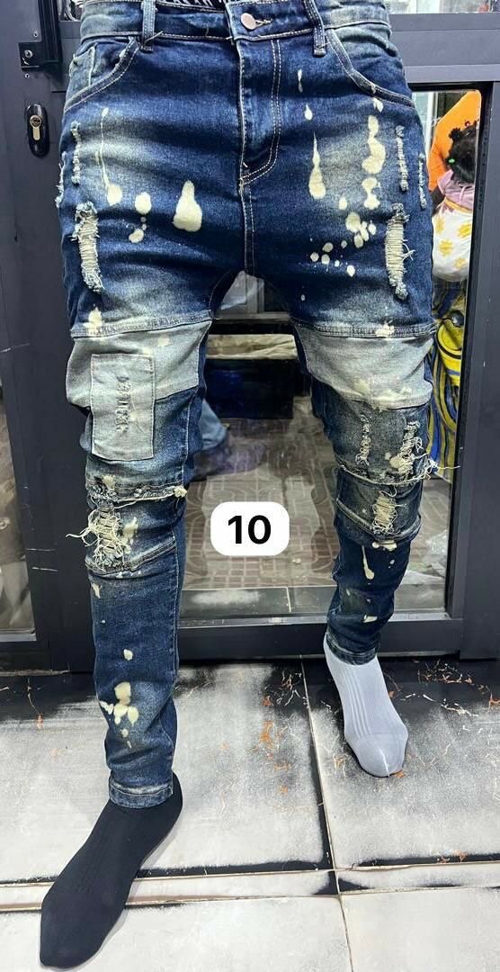 Jeans déchirés tendance homme