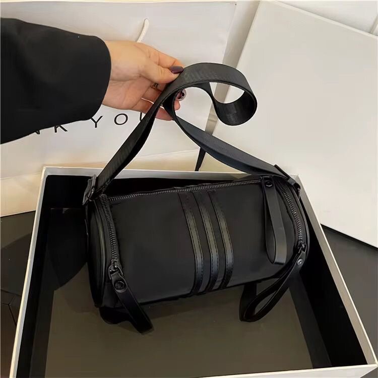 Sac bandoulière cylindrique