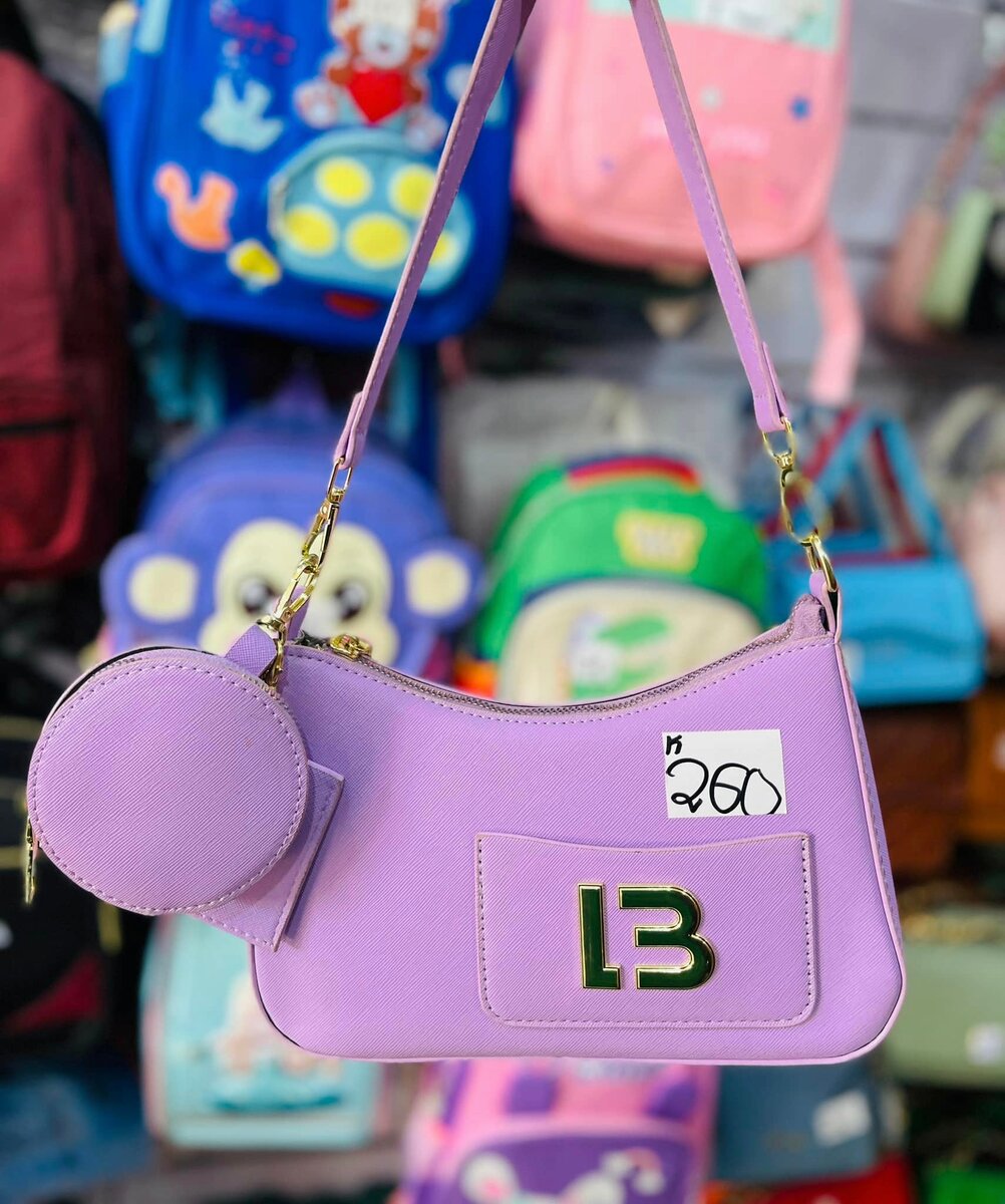 Ladies fancy hand bags white purple