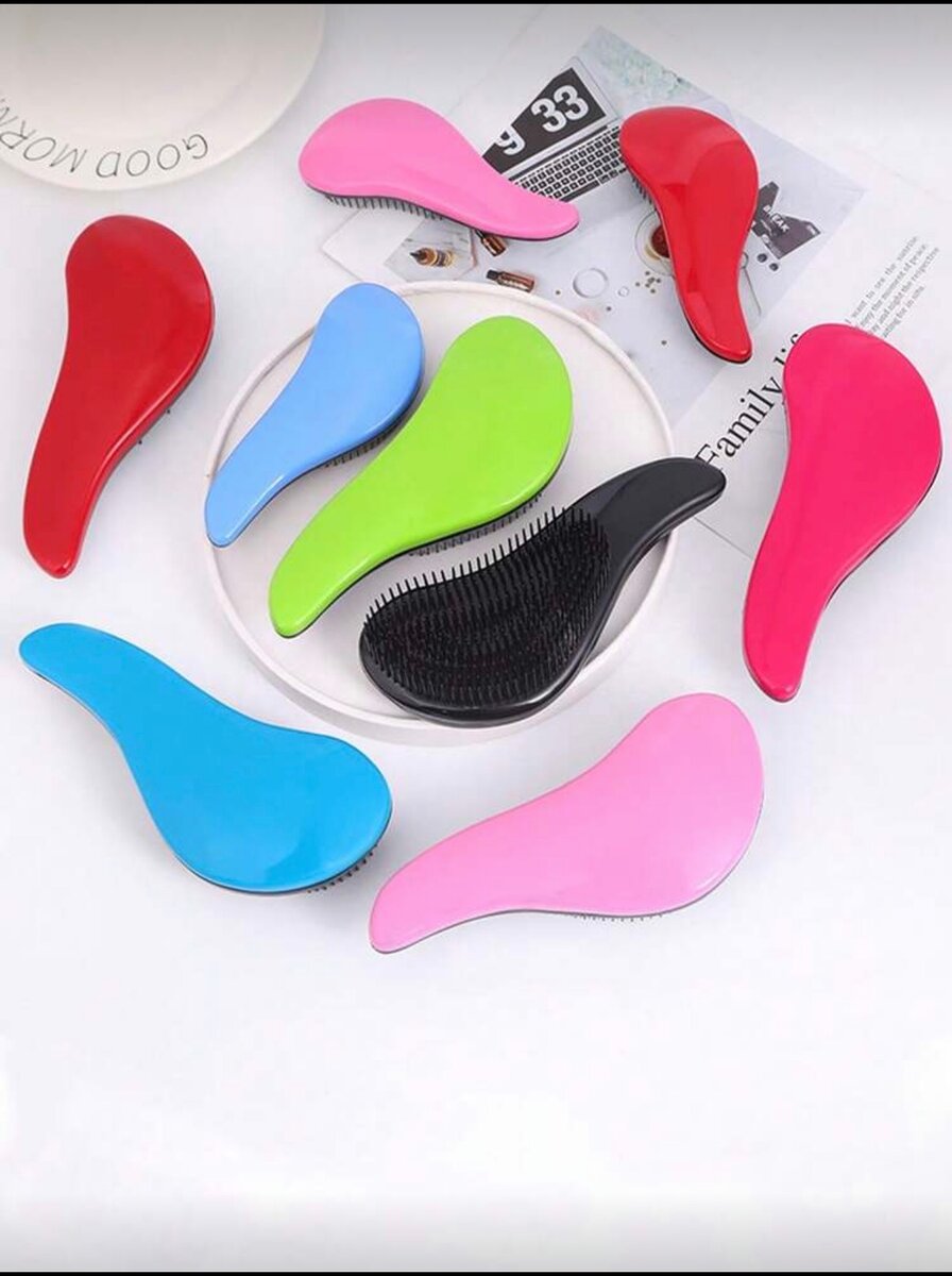 Brosse démêlante ergonomique