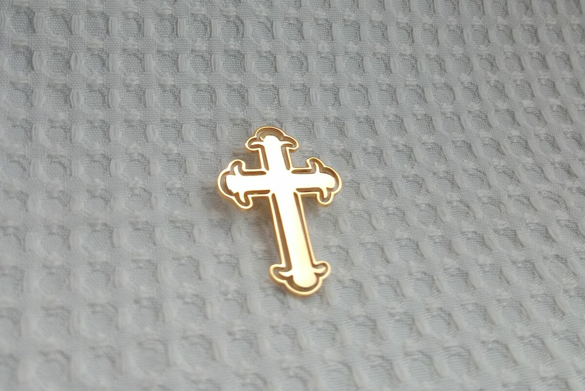 Cross lapel pin