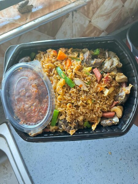 Jollof , fried rice . Angwamoo