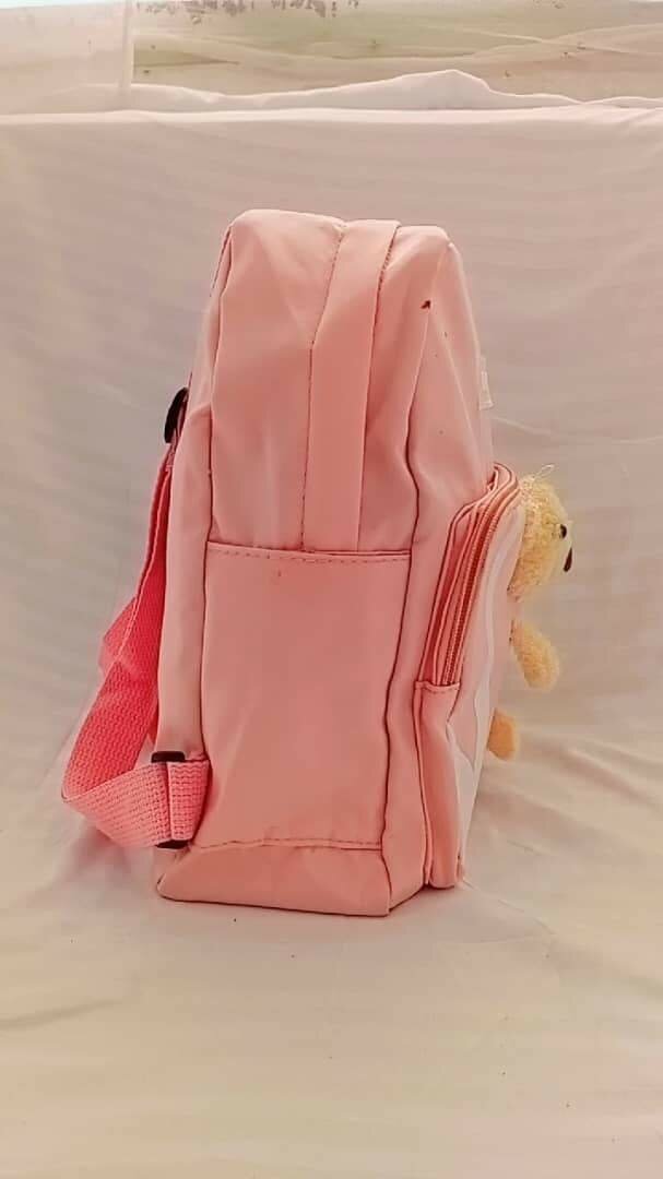 Sac rose enfant avec peluche