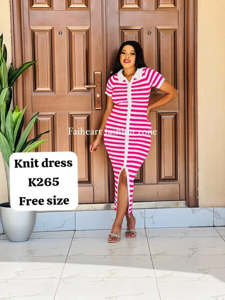 Knitted women's dress with a stripe of a free size  pink and white striped