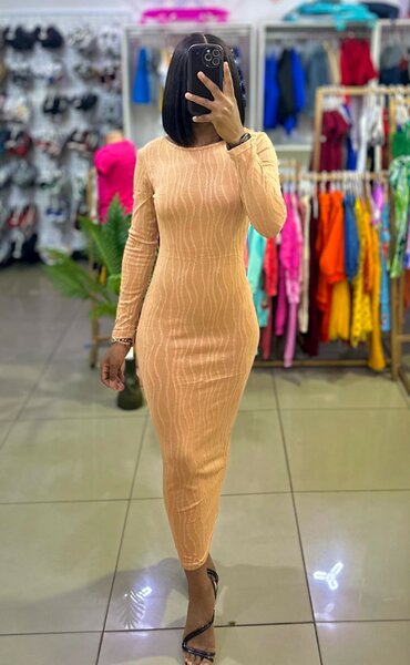 brown long dress with an ornament