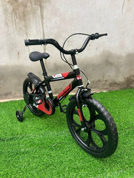 Vélo enfant avec stabilisateurs