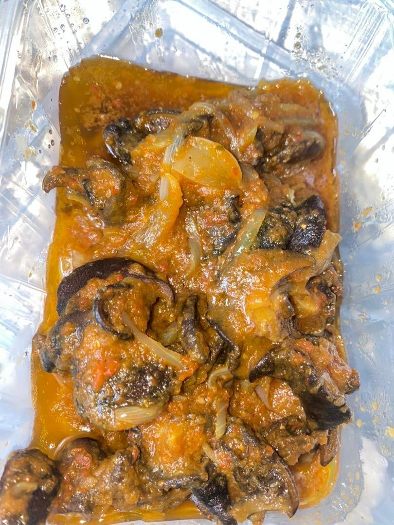 Escargots épicés en sauce