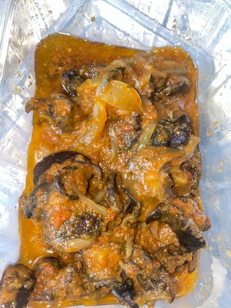 Escargots épicés en sauce