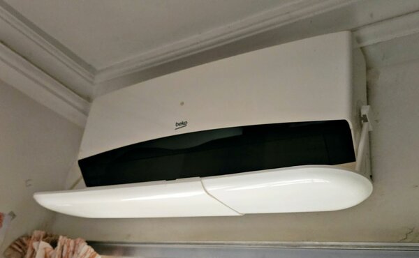 Déflecteur d'air - climatiseur