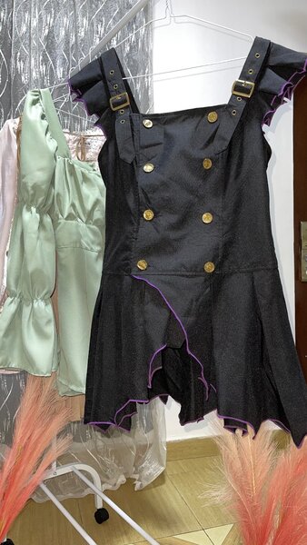 Corset dress/top depending on the person wearing(very short)