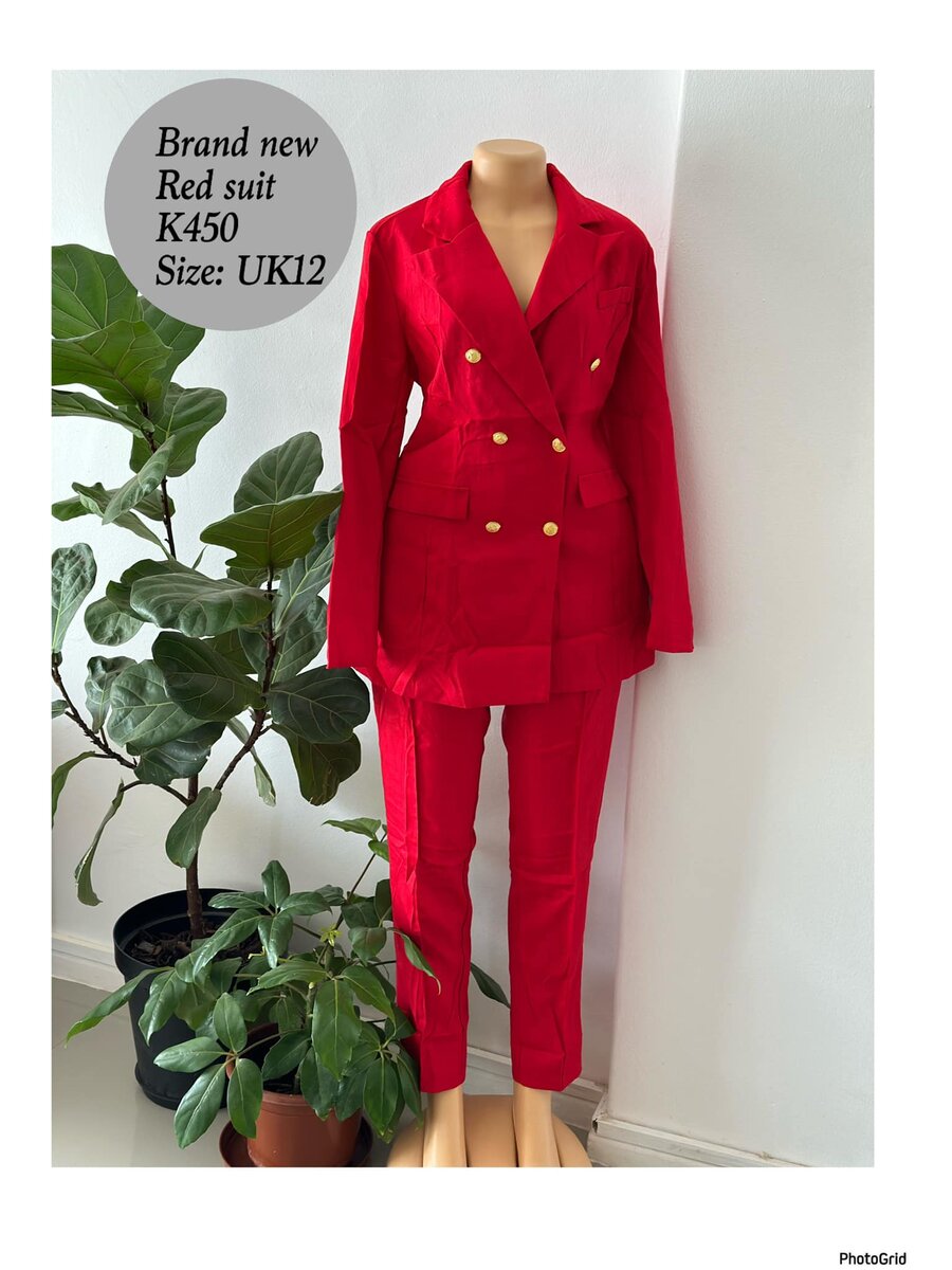 Women's red classic suit in size Uk12