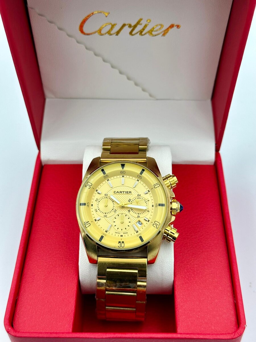 Montre homme dorée Cartier luxe