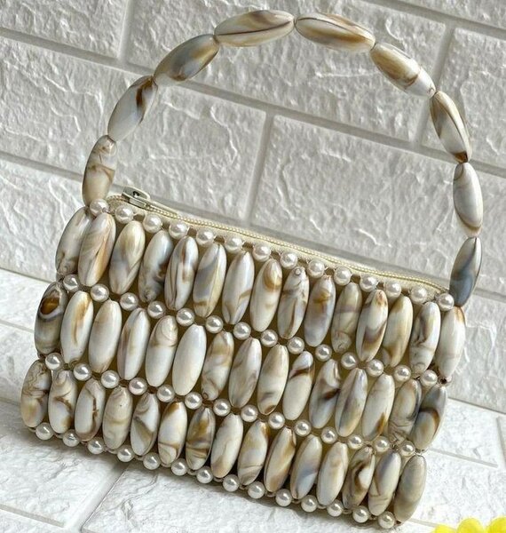 Sac à main perles élégant