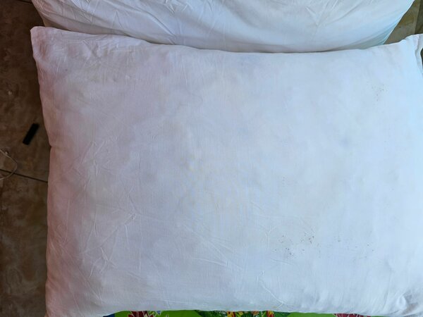 Pillow stuffed with cotton for comfortable sleep