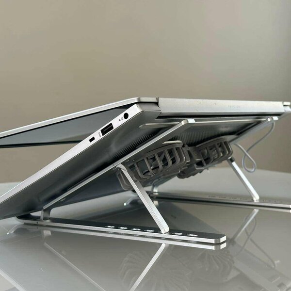 Laptops stand with cooling fan.