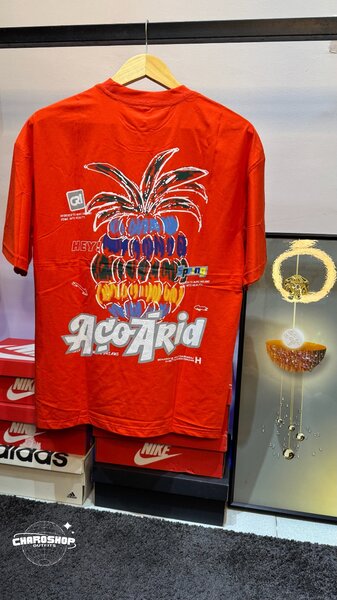 T-shirt orangeimprimé tropical