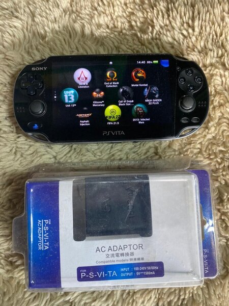 PS vita fat  occasion +20 jeux installés