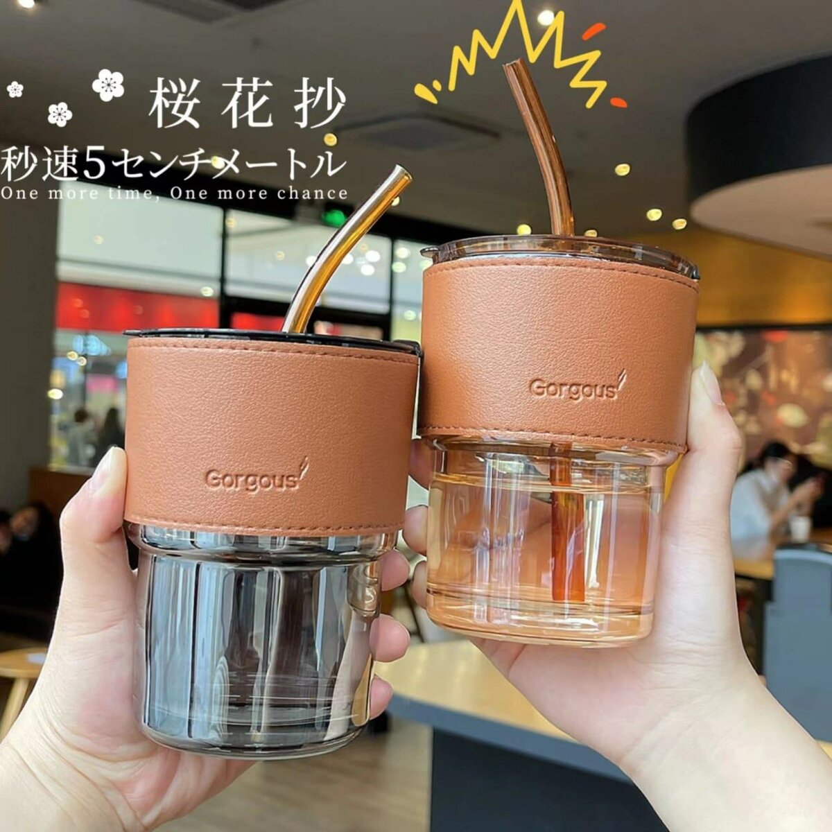 Glass cup with straw