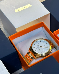 Montres de Luxe peau d'or avec cadran blanc